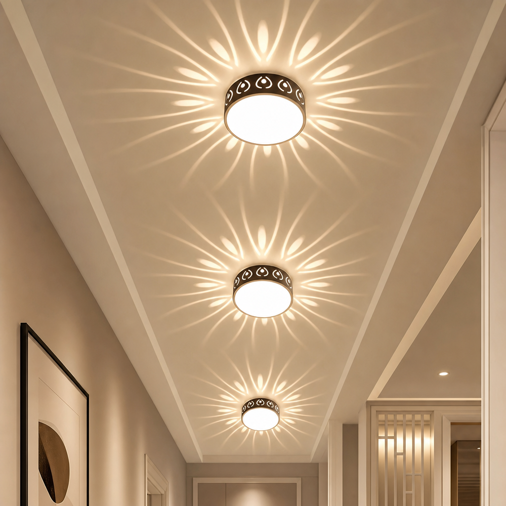 Three decorative flush mount ceiling lights cast floral light patterns along a hallway.