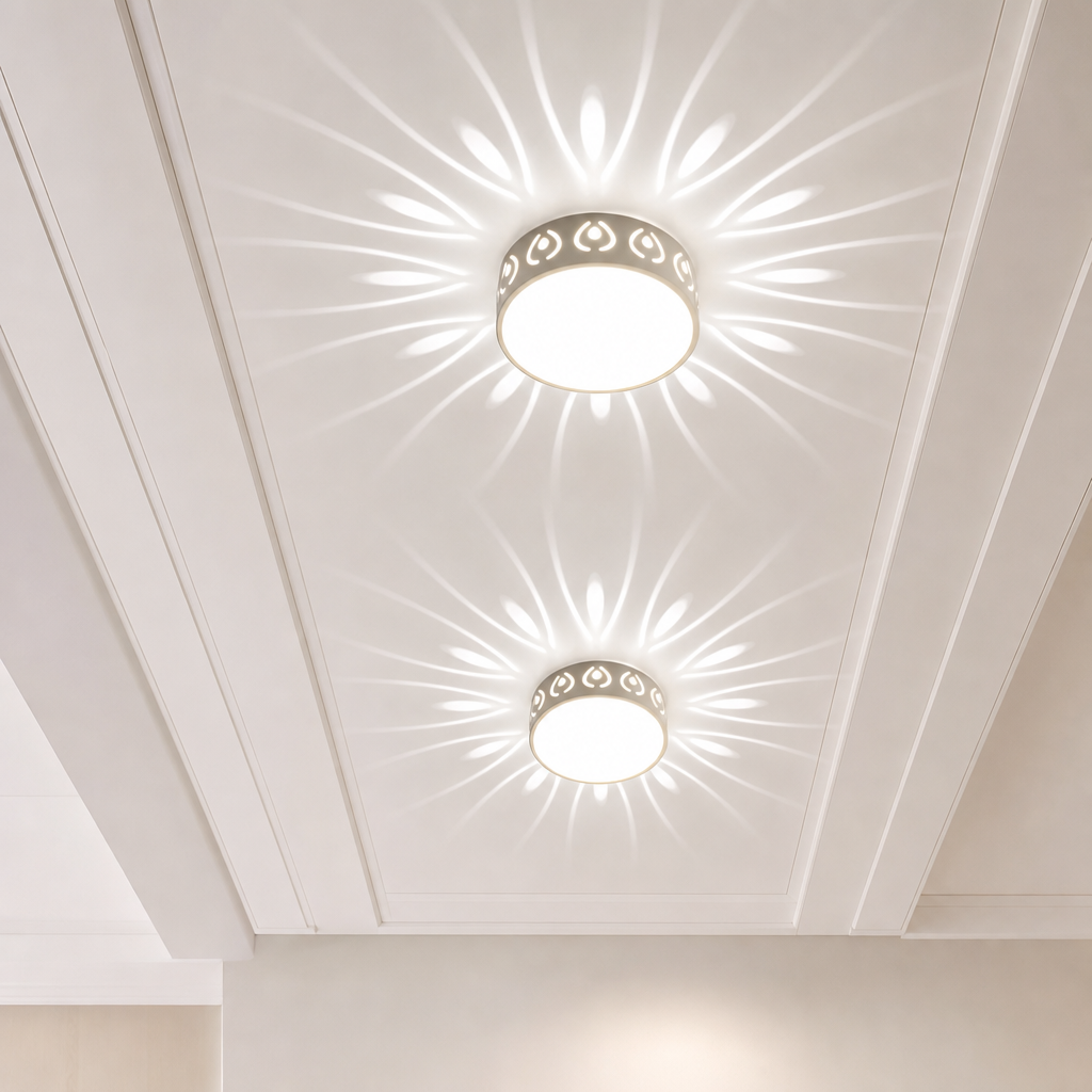 Two round ceiling lights cast bright floral patterns across a white paneled ceiling.