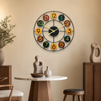 Colorful round wall clock with black metal frame and numbered wooden discs.