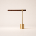 Brass and dark wood desk lamp with cylindrical base and horizontal bar shade.