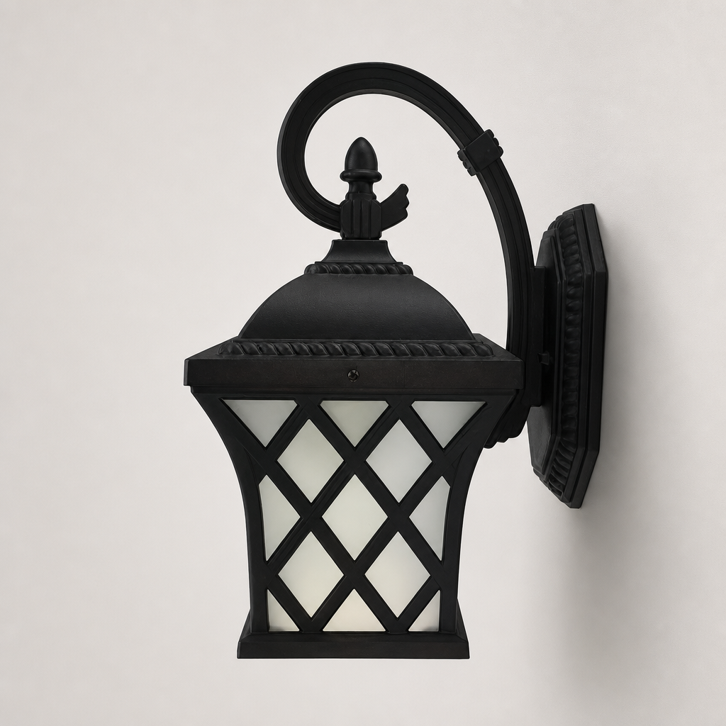 Black wall lantern with curved arm and diamond-pattern frosted glass shade.