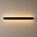 Long black rounded wall light with a white rim casting a warm glow.