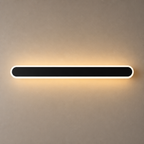 Long black rounded wall light with a white rim casting a warm glow.
