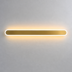 Long rounded wall light with a white glowing rim and warm amber center on a pale gray wall.