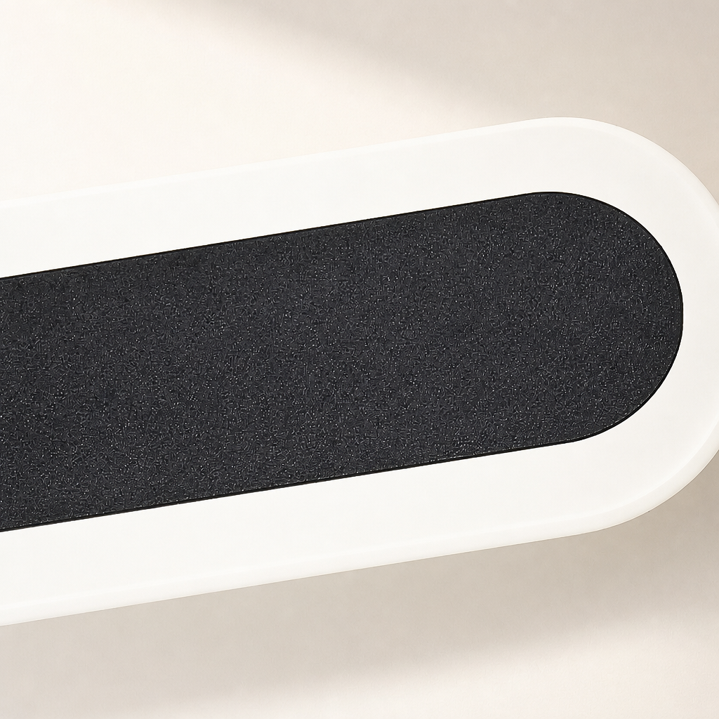 Black textured rounded grip inset in a white elongated tray.