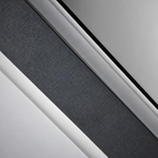 Close-up of a dark textured strip bordered by white and silver trim.