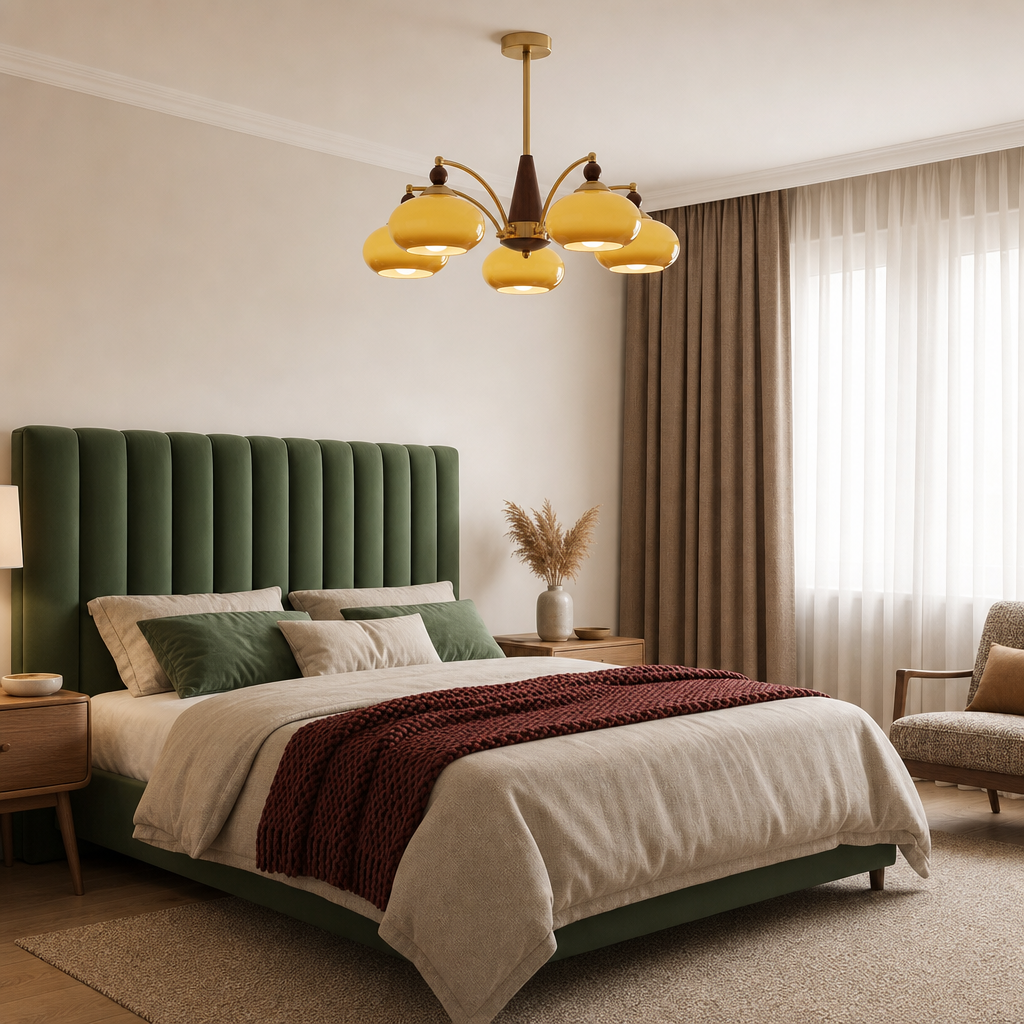 Yellow five-shade chandelier hanging above a cozy bedroom bed.