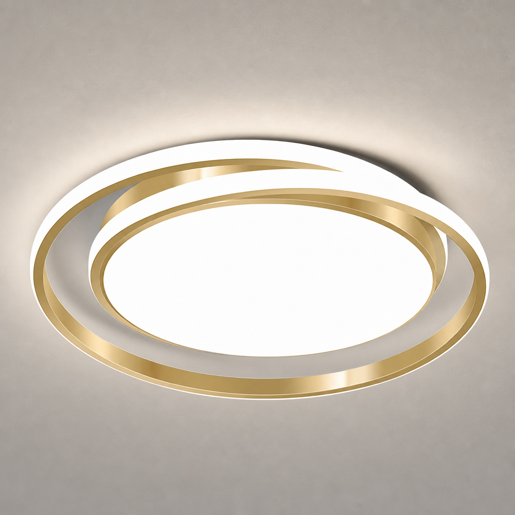 Gold and white circular LED ceiling light with a glowing center on a gray ceiling.