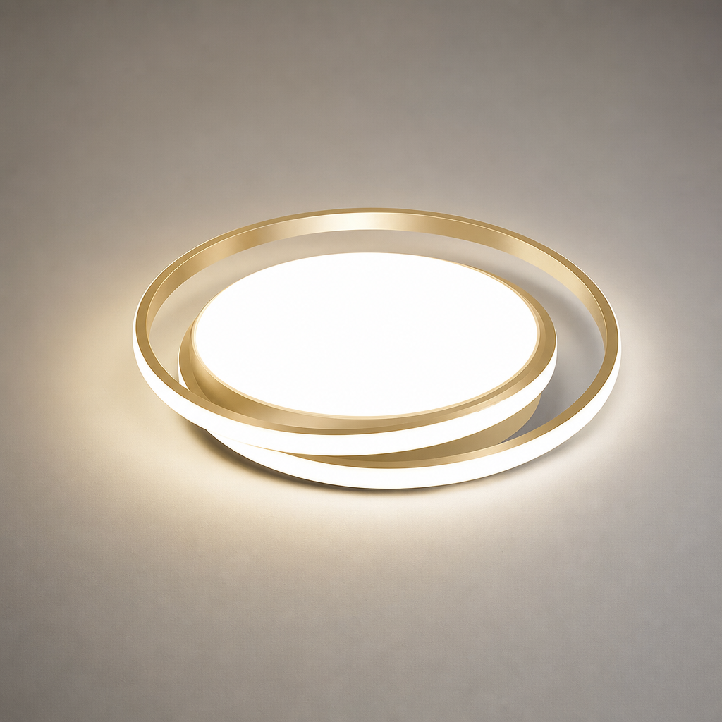 Gold circular LED ceiling light glowing on a neutral surface.