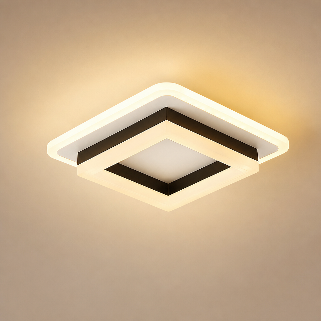 Square warm ceiling light with layered white frame and black inner trim glowing on a beige background.