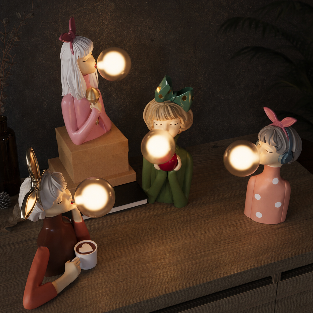Decorative girl figurine lamps blowing glowing bubblegum bubbles on a wooden tabletop.