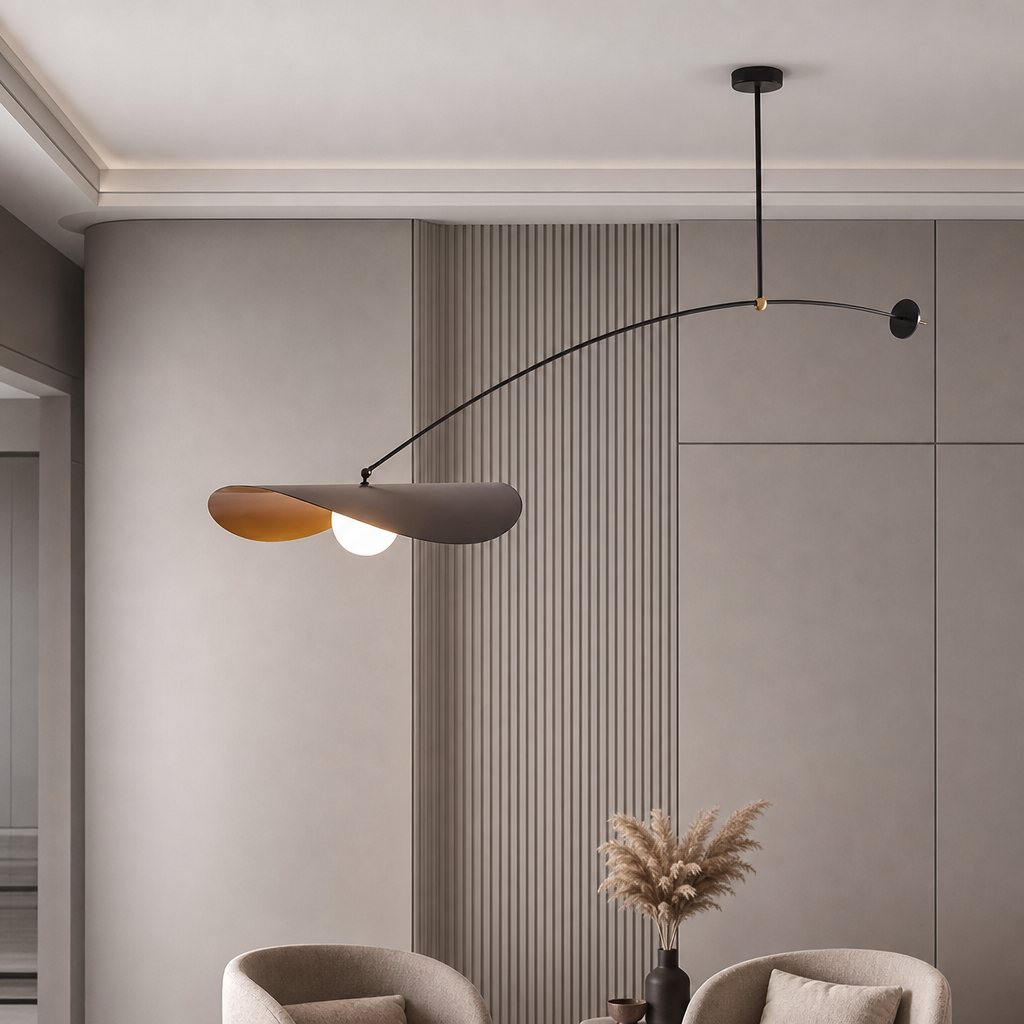 Modern black arc pendant lamp with petal shades and glowing bulb above a neutral living room wall.