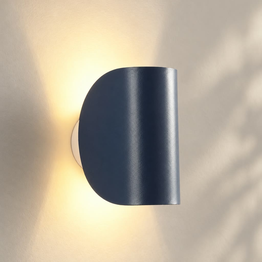Navy blue curved wall light with up-and-down lighting