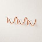 Rose gold wavy wall-mounted hook rail on a clean white surface.