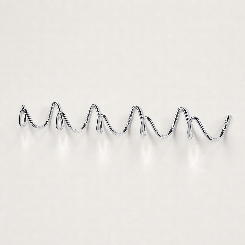 Chrome wavy wall-mounted multi-hook rack on a clean light background.