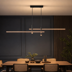 Black linear pendant light with warm glowing LED bars above a modern dining table.