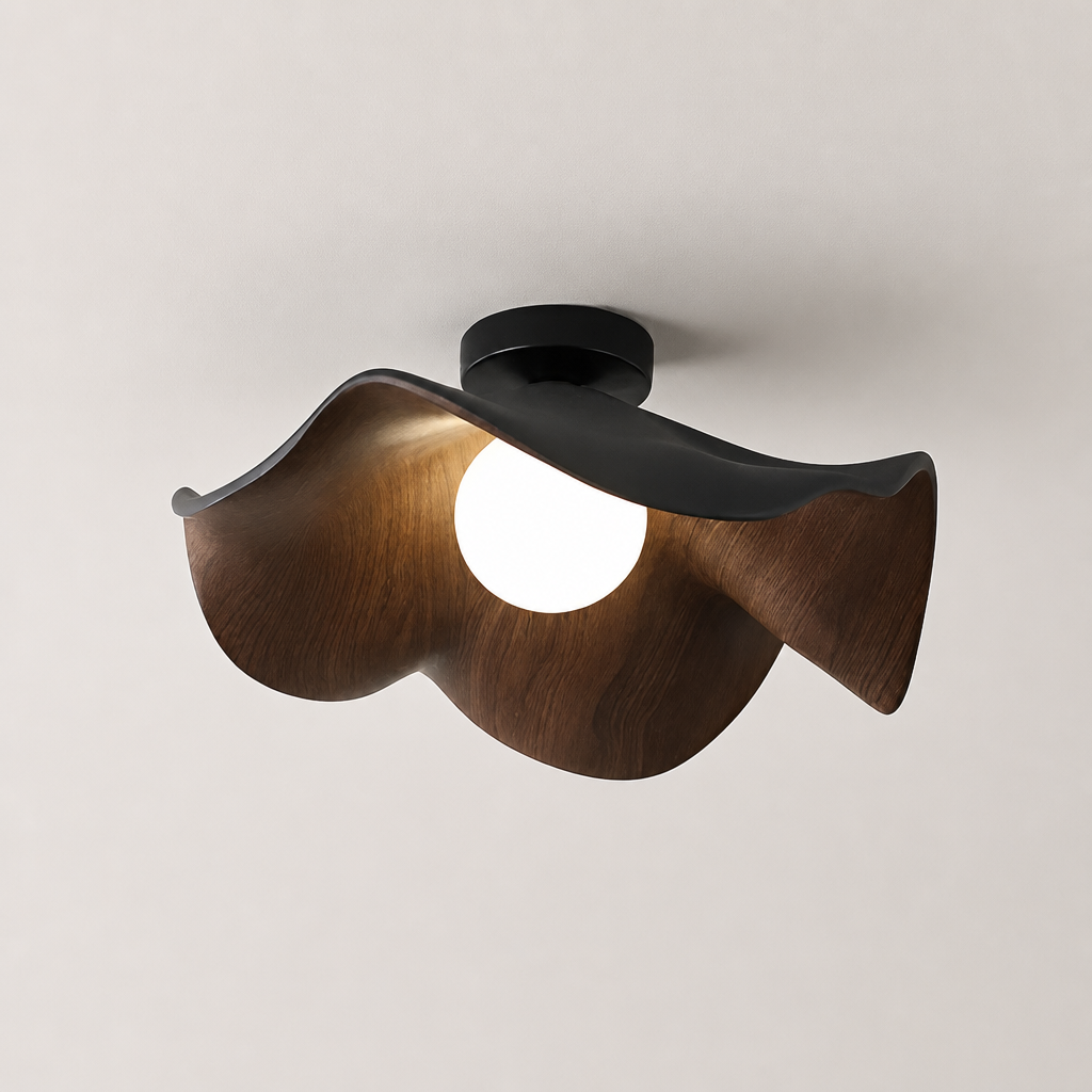 Wavy dark wood ceiling light with a glowing round bulb and black mount.
