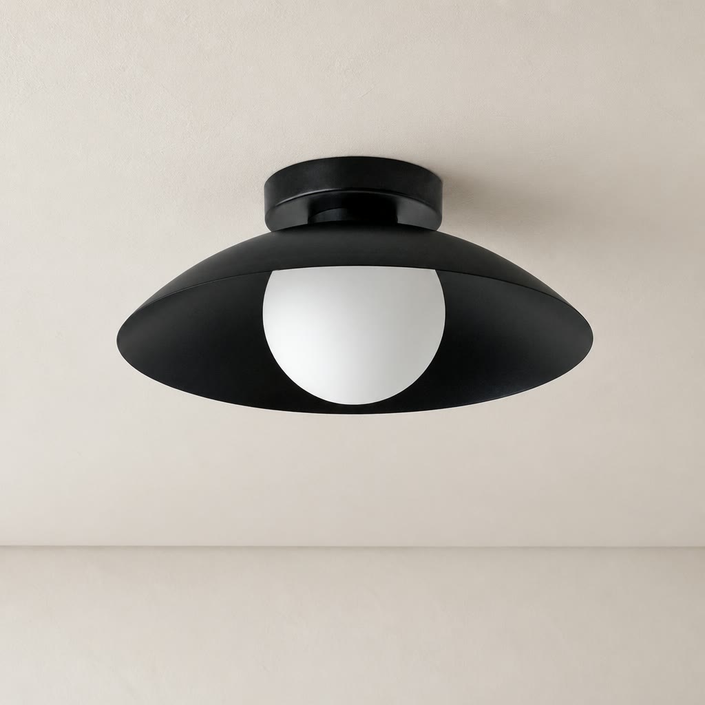 Black semi-flush ceiling light with a wide shade and white globe diffuser.