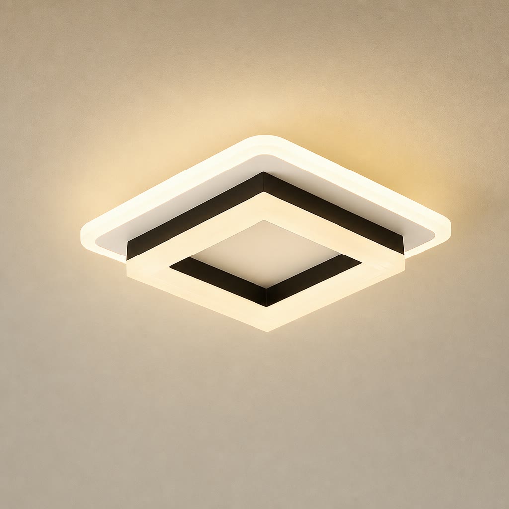 Square modern ceiling light with warm glow, white layered frame, and black geometric trim.
