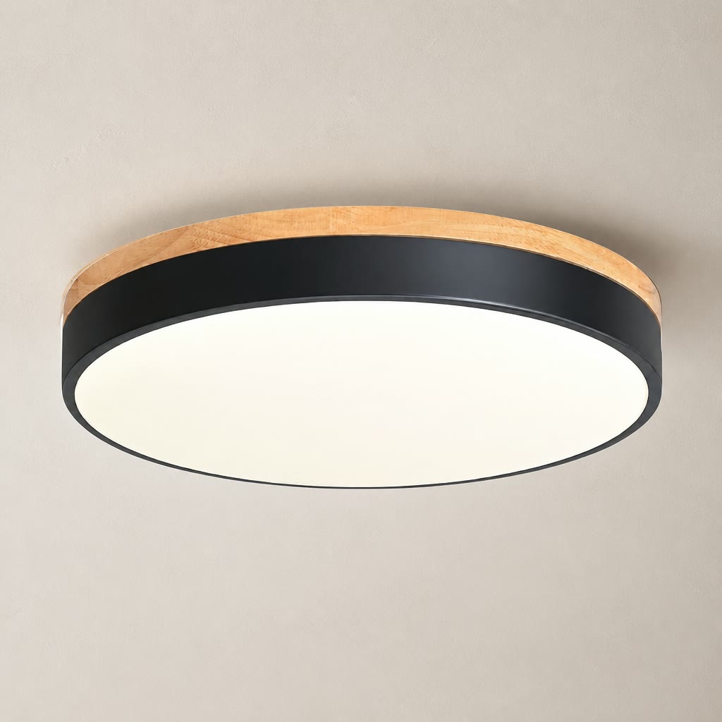 Round ceiling light with wood trim, black band, and glowing white diffuser.