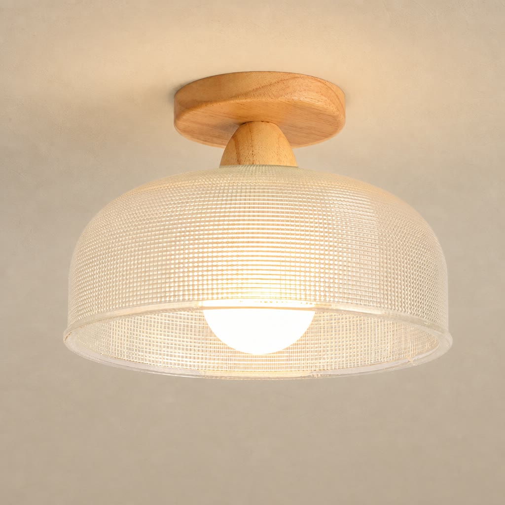 Warm glowing ceiling light with a wood mount and cream woven drum shade.