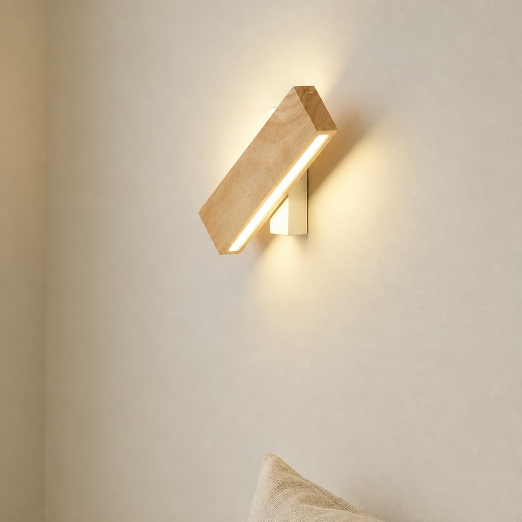Wooden diagonal wall sconce with warm LED light on a plain wall.