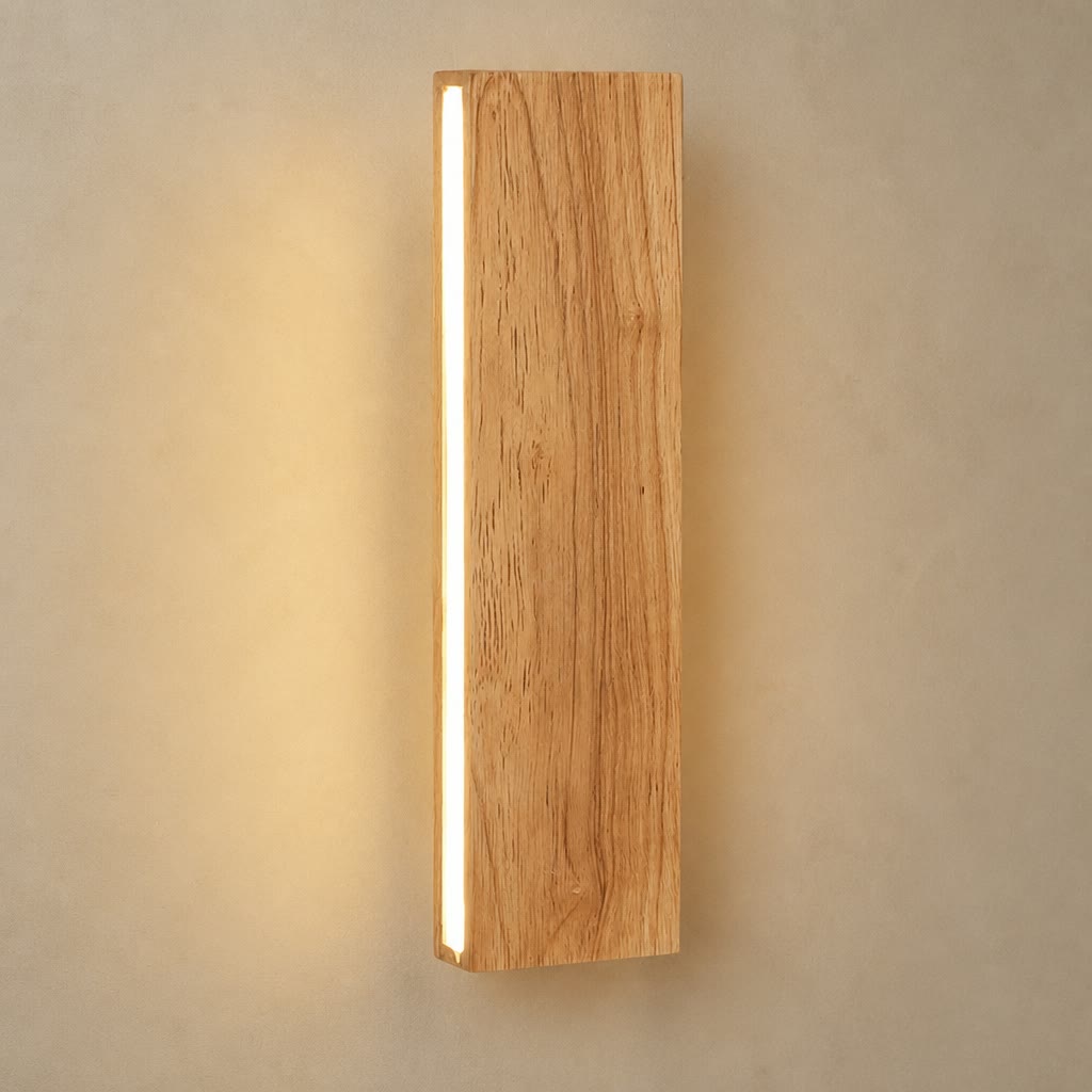 Wooden wall sconce with a vertical warm LED strip on a neutral wall.