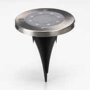 Stainless steel round LED garden spike light with a black tapered ground stake.