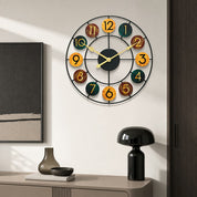 Colorful round wall clock with black metal frame and numbered wooden discs.