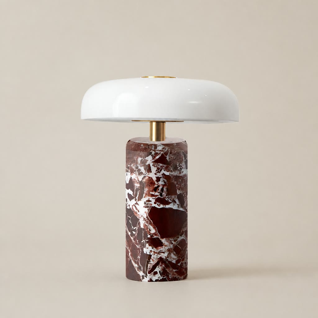 Glossy white mushroom table lamp with brass stem and red marble cylinder base.