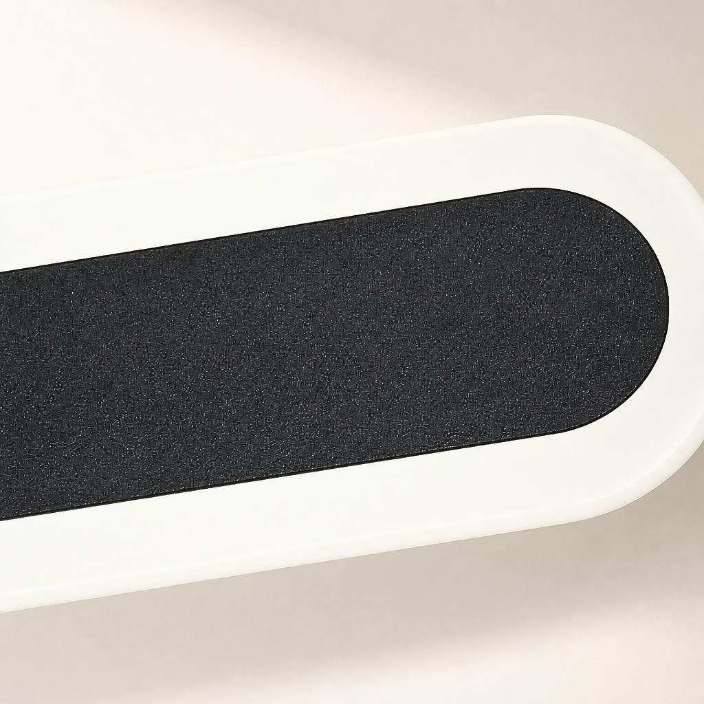 Black textured rounded grip inset in a white elongated tray.