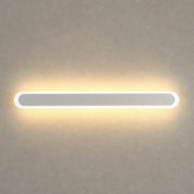 Long rounded wall light with a warm glow on a neutral textured wall.