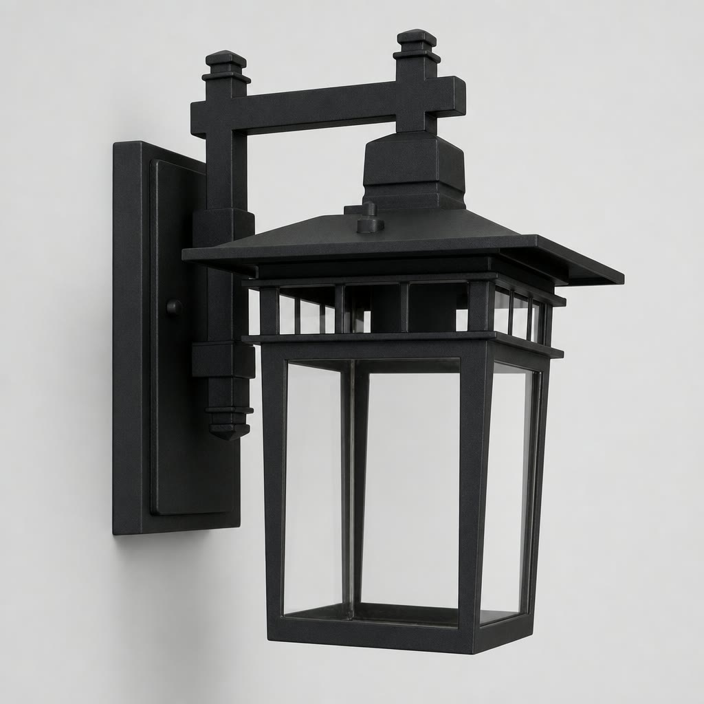 Black outdoor wall lantern sconce with clear glass panels on a plain light background.