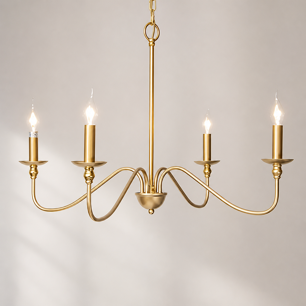 Gold five-light chandelier with curved arms and candle-style bulbs on a pale gray background.