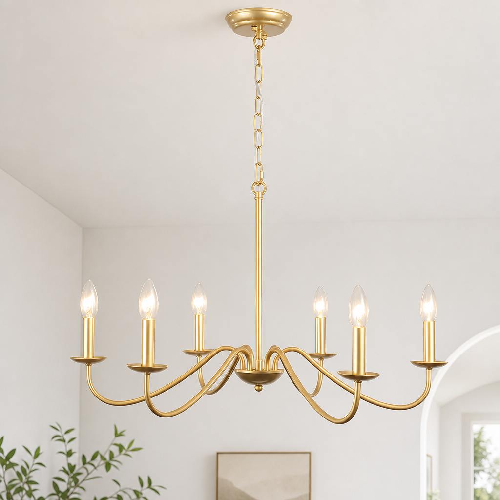 Gold six-light chandelier with candle bulbs suspended from a chain in a bright modern room.
