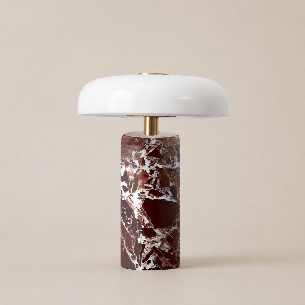Glossy white mushroom table lamp with brass stem and red marble cylinder base.