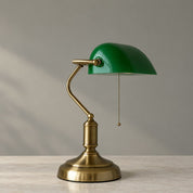 Green banker’s desk lamp with antique brass finish