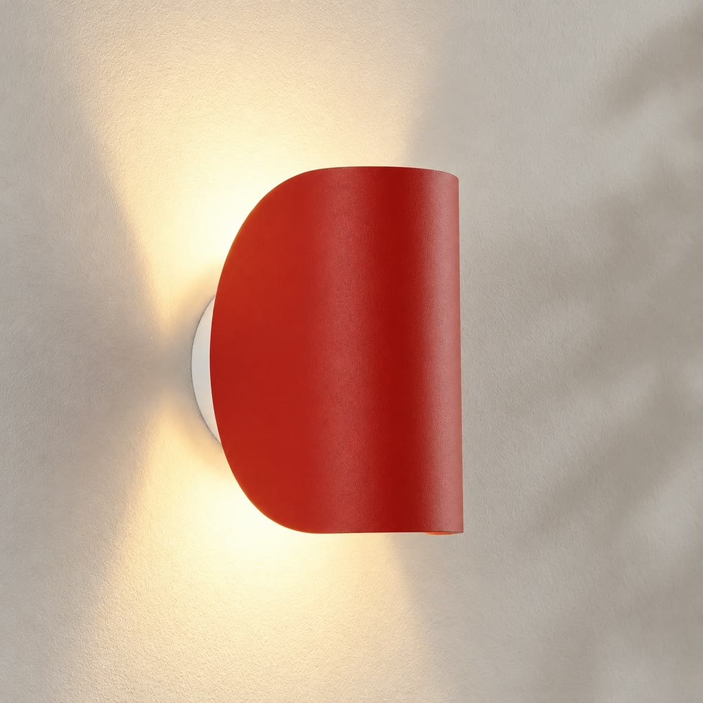 Red curved wall light with up-and-down lighting