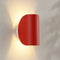 Red curved wall light with up-and-down lighting