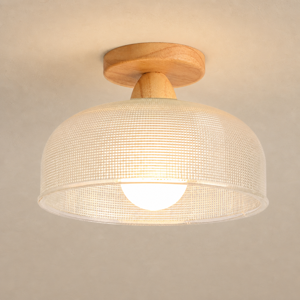 Warm glowing ceiling light with a wood mount and cream woven drum shade.