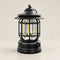 Black rechargeable camping lantern with a protective cage, shown unlit.