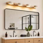 Four-light wood and concrete vanity fixture above a bathroom mirror.