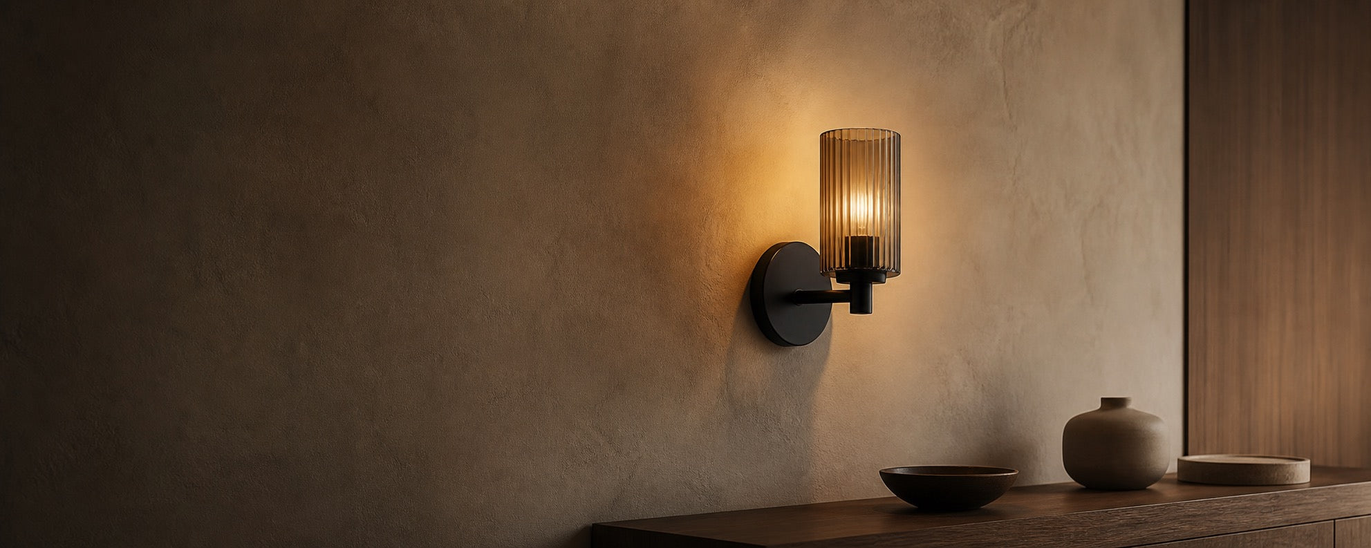 Monzalo hero option 1 warm wall sconce with clean console vignette